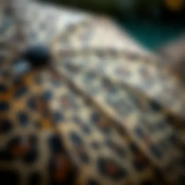 Close-up of a stylish leopard print umbrella with raindrops