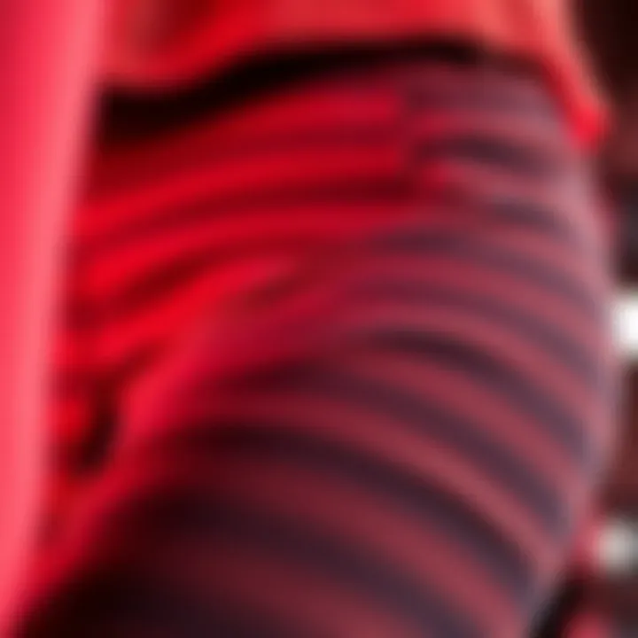 Close-up view of fabric and design details of neon biker shorts