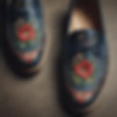 Artistic embroidery detailing on loafers