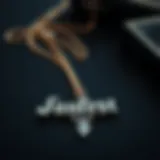 An elegant gothic font necklace displayed on a velvet surface
