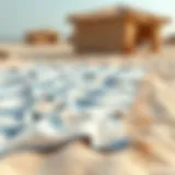 Luxurious beach towel spread on sand