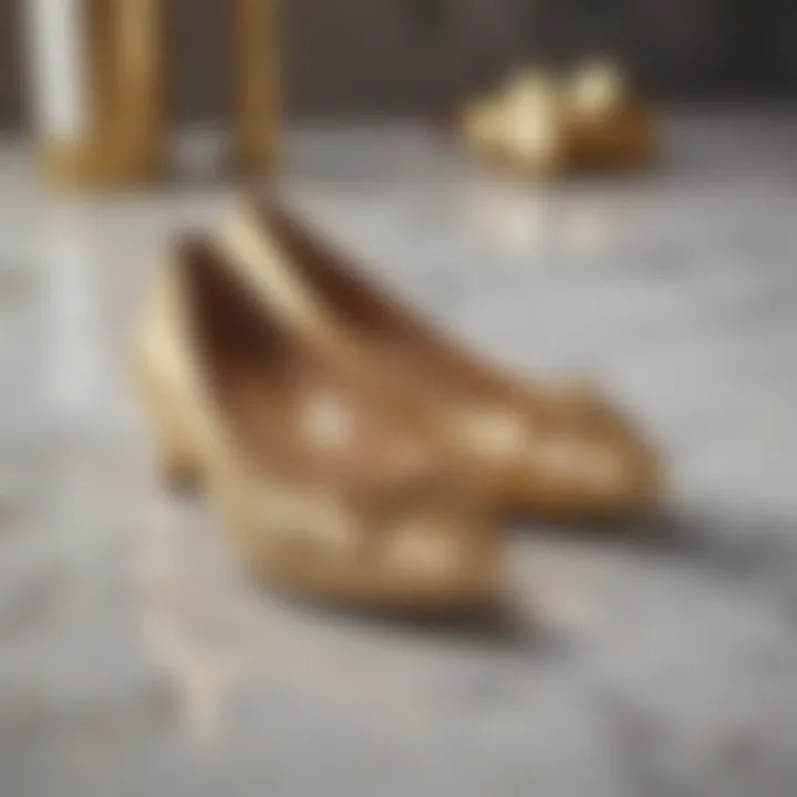 Elegant gold sparkly flat shoes displayed on a marble countertop