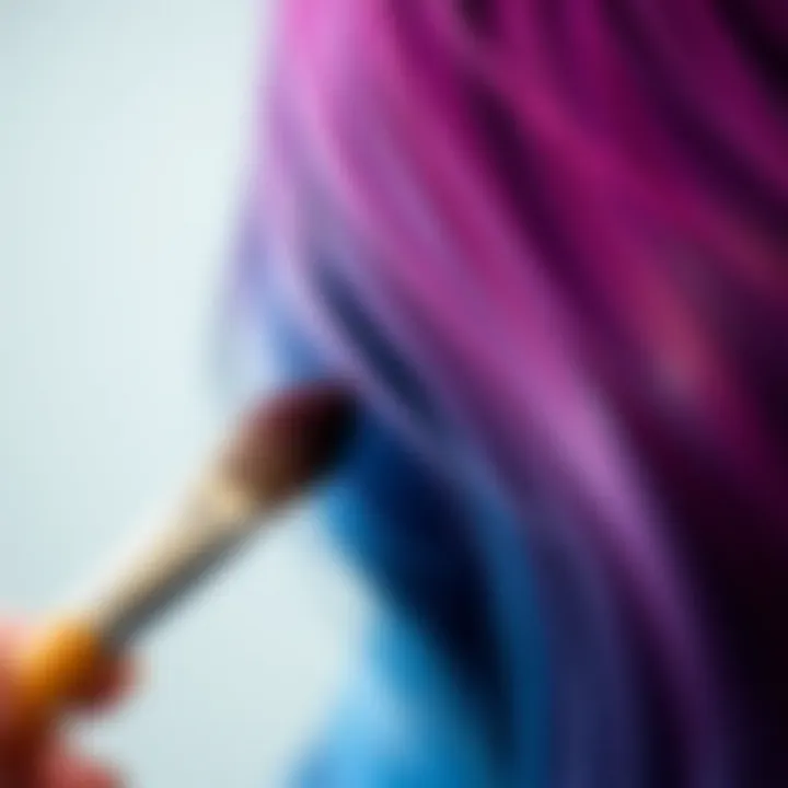 A close-up of a hair dye brush in action applying color to hair strands