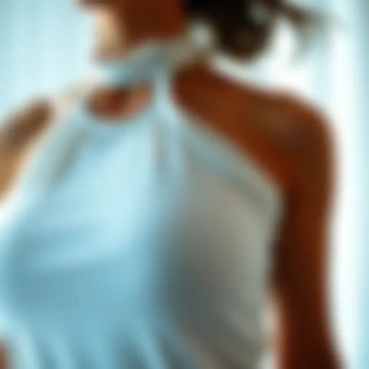 Close-up of fabric texture of the white halterneck bodysuit
