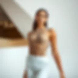 Elegant sleeveless sheer bodysuit showcased on a minimalist backdrop