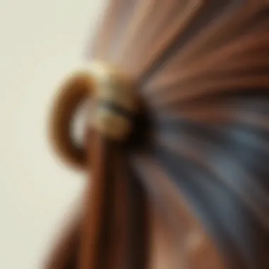 Close-up of coil wire hair tie on hair showcasing its ergonomic features